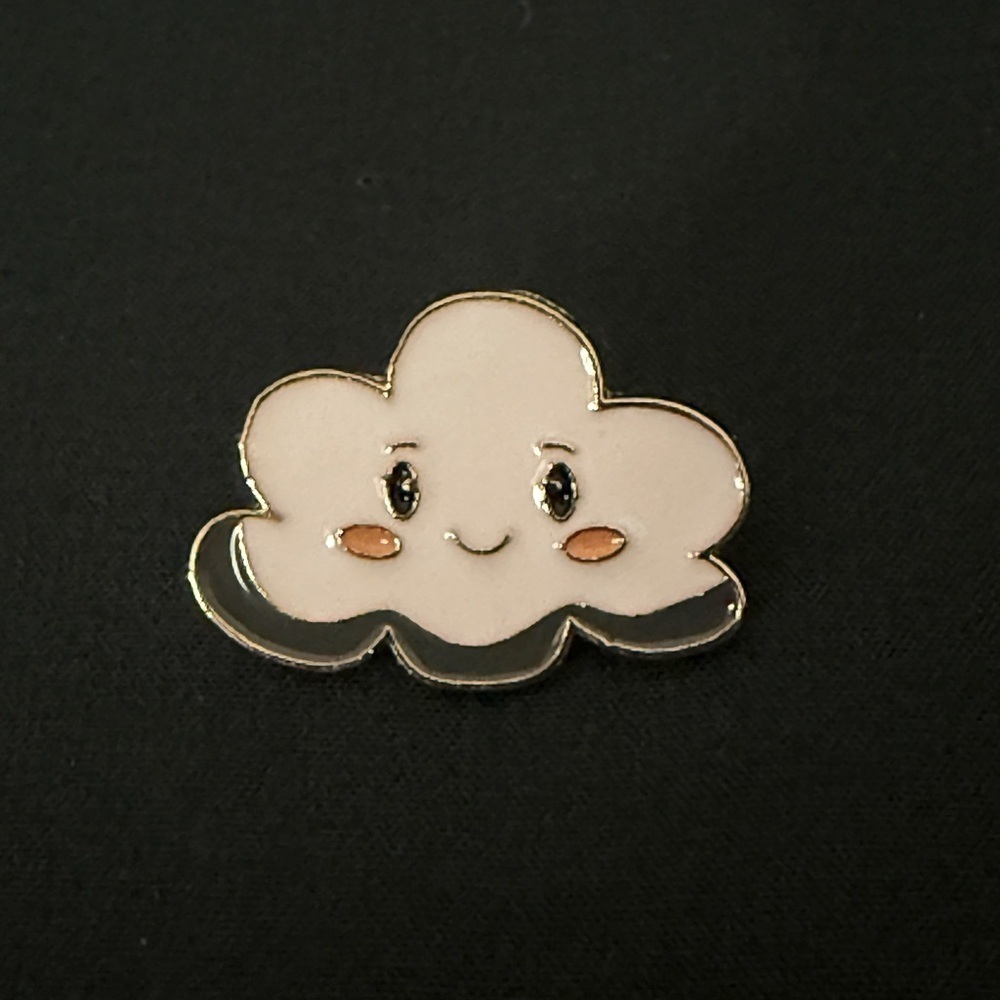 Women’s Jewelry White Cloud Enamel Pin with Accents of Gold, Black,Orange& Blue